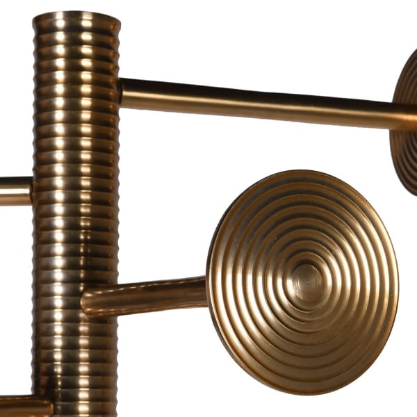 Close-up of aged brass coat stand with ribbed detailing and circular hooks, showcasing its luxurious and stylish design for home decor.