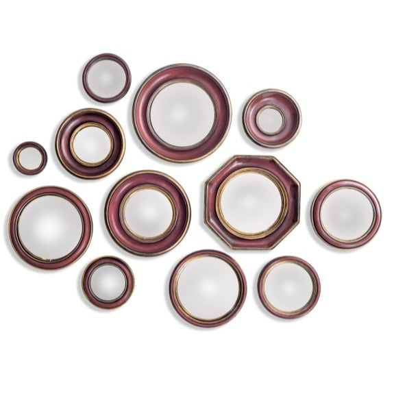 Mini convex Red & gold framed mirrors which come in an assortment of sizes ranging from 13cm for the smallest up to 28cm for the largest.Grouping these mirrors on your wall has become a statement look on the walls in stylish period homes and this particular green colour works perfectly in that situ.These sets also come in red, black and the original gold colour, twelve assorted sizes that you can use to decorate your home
