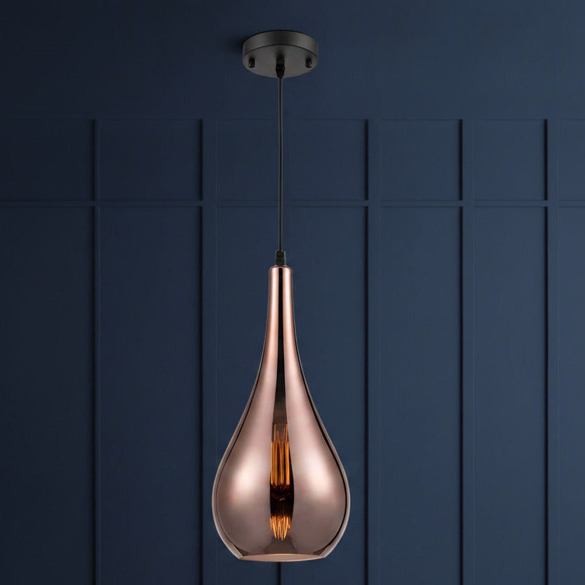 Sleek, slim copper glass pendant, a beautiful colour. perfect island pendant. Long teardrop design, contemporary. These jewelled coloured lights are perfect over a kitchen island.


