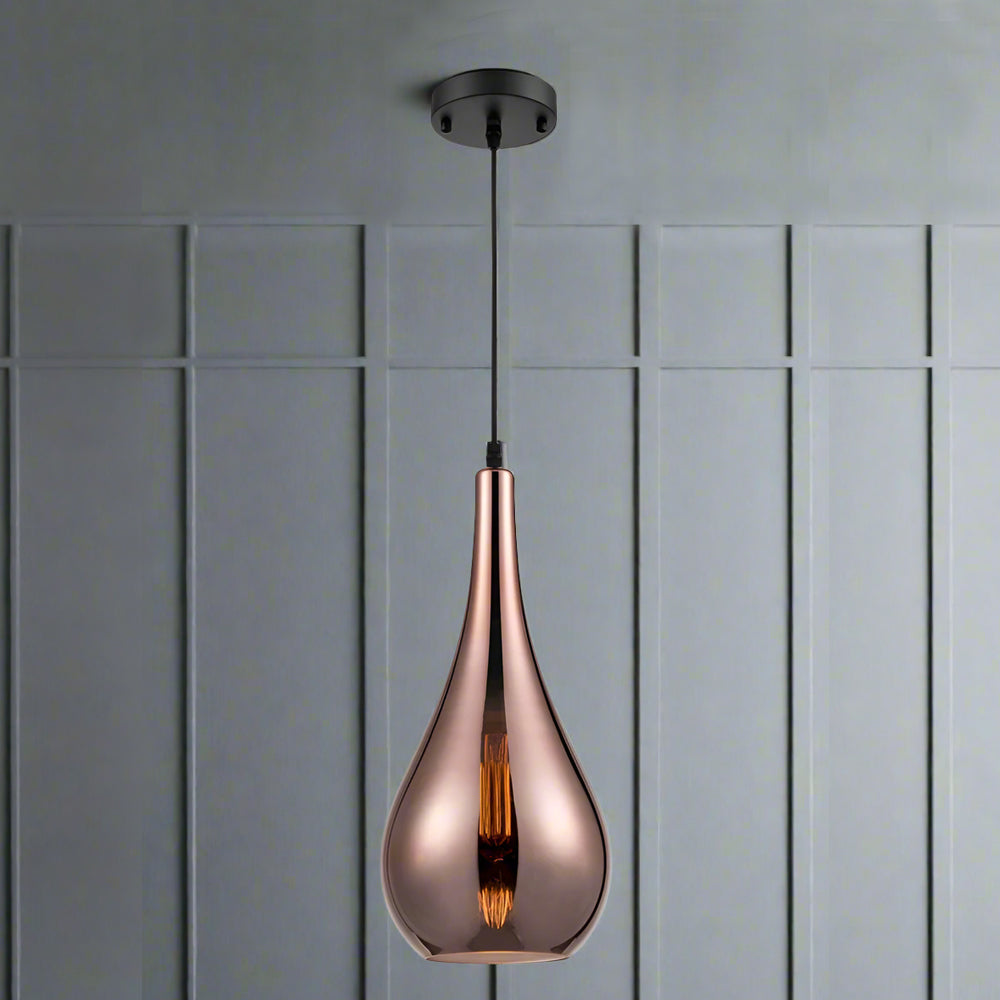 Sleek, slim copper glass pendant, a beautiful colour. perfect island pendant. Long teardrop design, contemporary. These jewelled coloured lights are perfect over a kitchen island.

