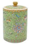 Handcrafted green ceramic scented candle jar with gold detailing and floral pattern, scented with warm amber, florals, and woods.