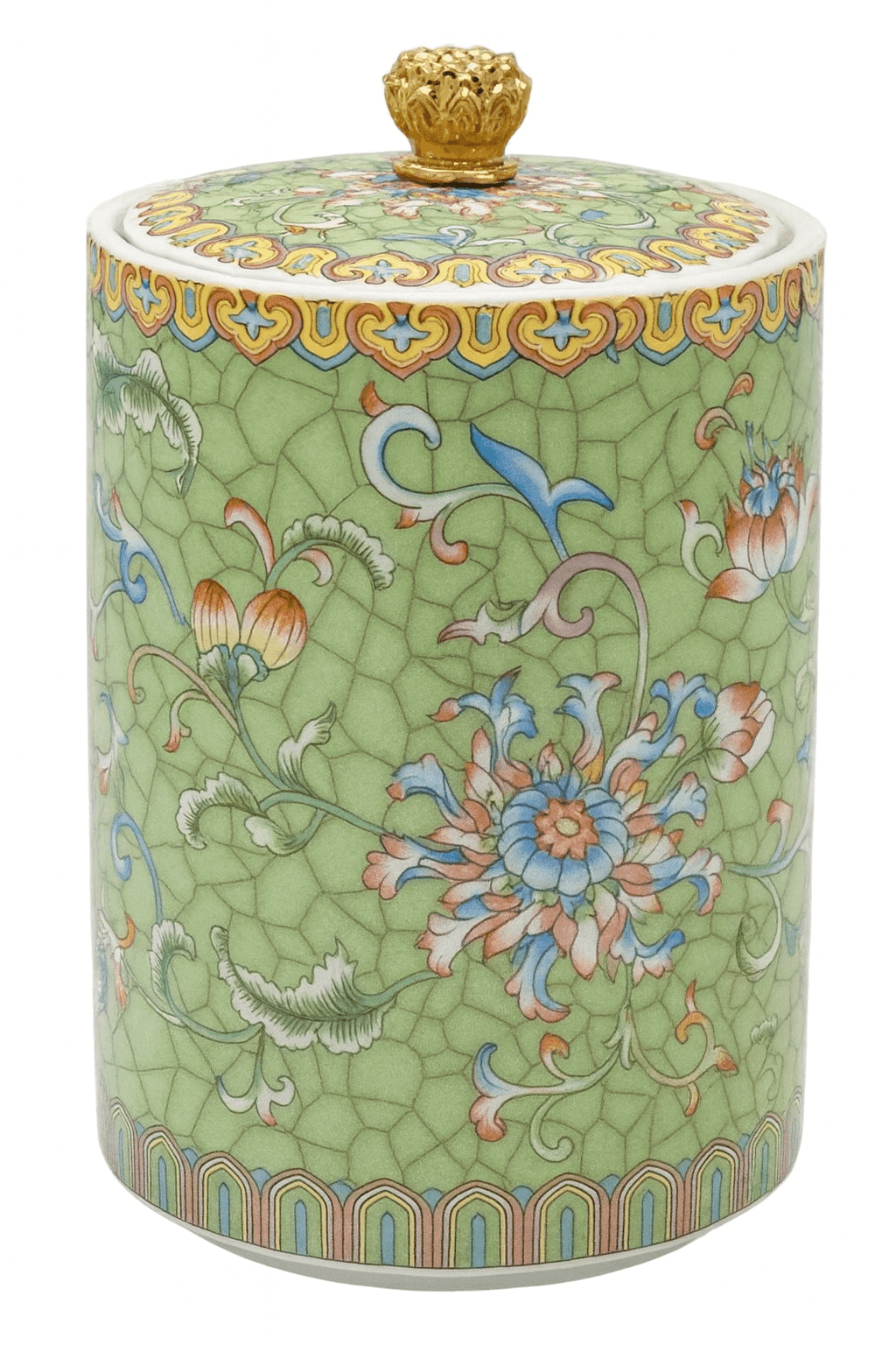 Handcrafted green ceramic scented candle jar with gold detailing and floral pattern, scented with warm amber, florals, and woods.