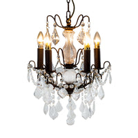 French bronze five-arm crystal chandelier with ornate frame and crystal droplets.