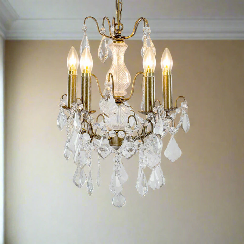 French gold five-arm crystal chandelier with faceted crystal droplets in living room