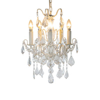 French white five-arm crystal chandelier with faceted crystal droplets.