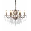 Gold six-arm shallow crystal chandelier with faceted crystal drops.