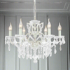 White six-arm shallow crystal chandelier with faceted crystal drops