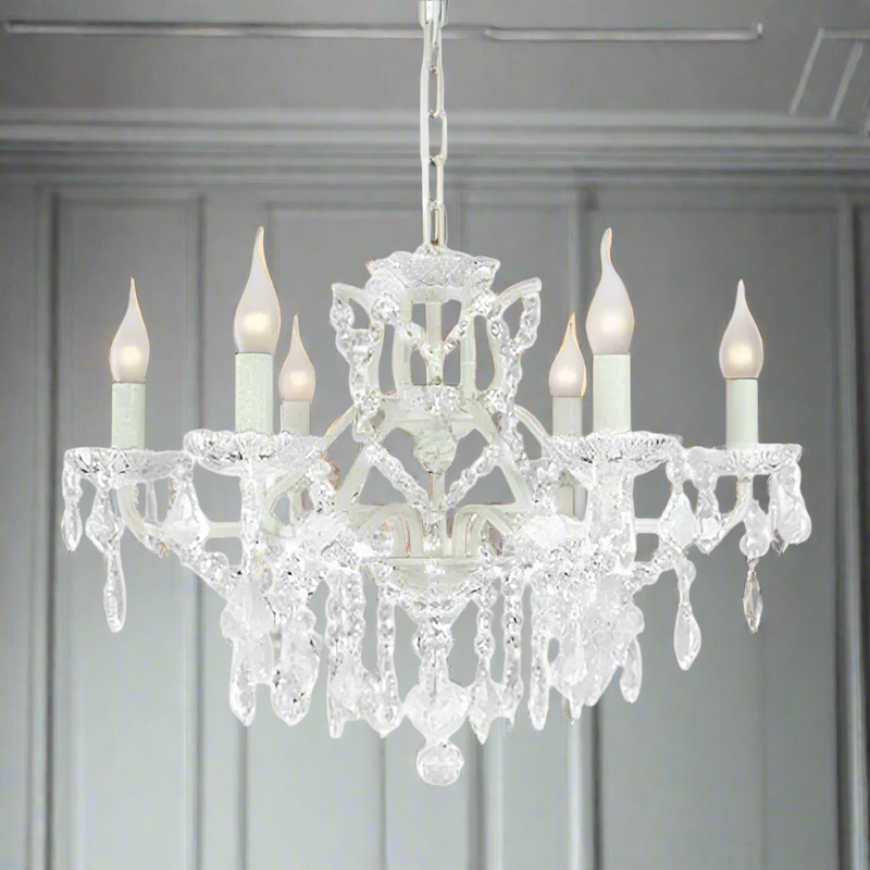 White six-arm shallow crystal chandelier with faceted crystal drops