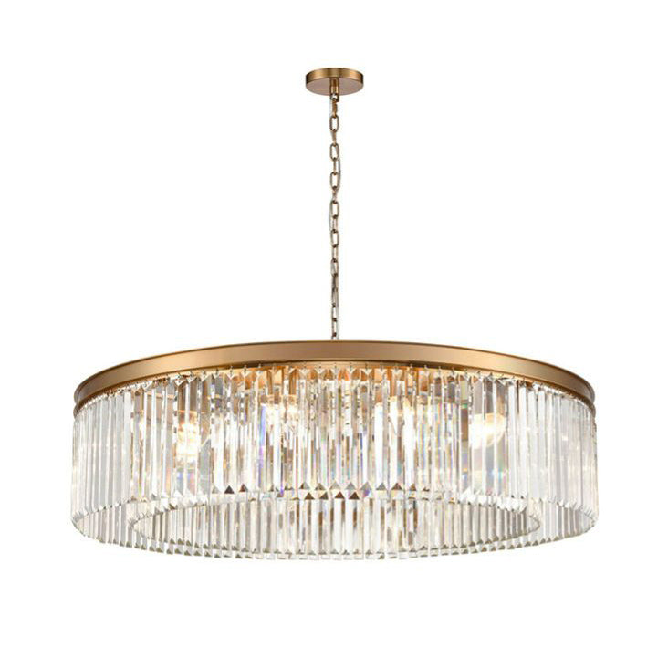 This chandelier pairs a smooth gold band with rows of shimmering prism-cut crystals, creating a striking, luxurious glow. With its impressive 100 cm width