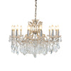 This grand twelve-arm chandelier blends a silver frame with layers of sparkling crystals, creating a soft, romantic glow that brings elegance to any room.