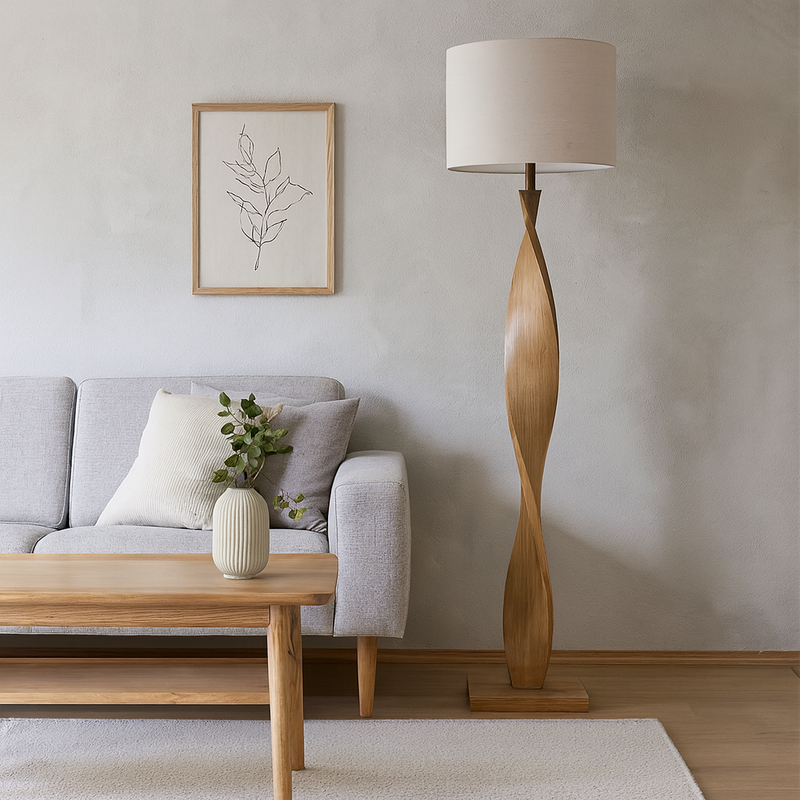 Pale wooden curved floor lamp, great in a Scandi interior. The design is exceptional in a living room or hall the pale linen shade allows light to our out.