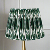 Dark Green Pleated Lamp Shade. Large, patterned, pleated shade in a dark green and white colouring.