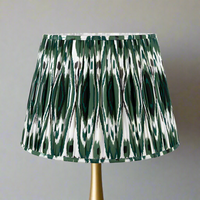 Dark Green Pleated Lamp Shade. Large, patterned, pleated shade in a dark green and white colouring.