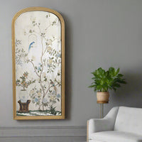 A stunning piece of mirrored wall art, a classic bird and flowers 'Victorian' style image on an arched mirror. The reflective surface creates a light enhancing focal point.