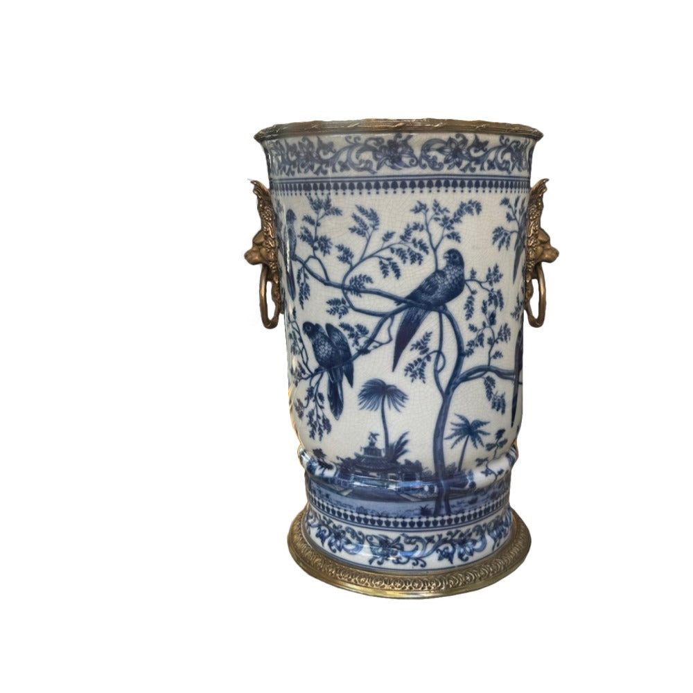 Decorative vase with blue and white floral and bird pattern on a white background