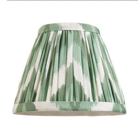 16cm tapered shade with a clip to fit golf or candle bulbs. Unique chevron pattern design in green with taped edge detailing.
Perfect when paired with decorative table lights, wall lights or chandeliers.
