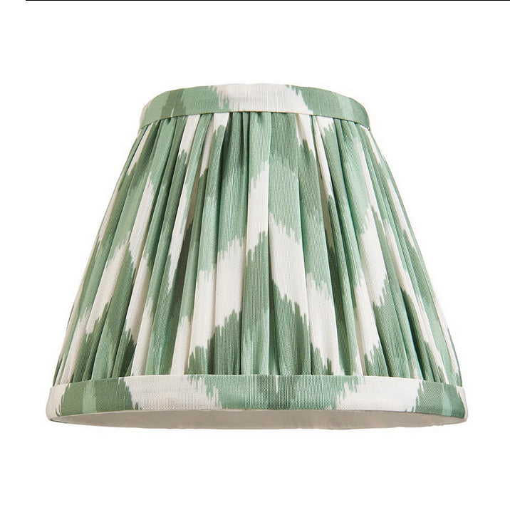 16cm tapered shade with a clip to fit golf or candle bulbs. Unique chevron pattern design in green with taped edge detailing.
Perfect when paired with decorative table lights, wall lights or chandeliers.