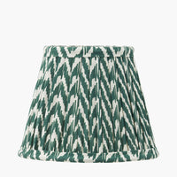 16cm pleated lampshade in green and ivory patterned pattern with hand-finished rolled edges.