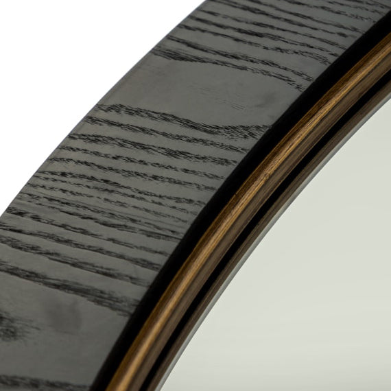 Close up and detail of the black wooden frame of this extra large round mirror.