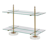 A brass, glass and marble table top shelving unit.&nbsp; Rectangular glass shelves sitting on a brushed brass stand.&nbsp; The two tier shelf sits on a table to display all your most decorative objet d'art.&nbsp; A perfect retail shelf for jewelry, perfume or accessories,&nbsp; Two brass poles set into round marble feet hold the brass struts for the glass shelving.&nbsp; In your bathroom, bedroom or in a retails pace the perfect way to show off all your prized items.