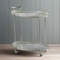 Silver drinks trolley against a paneled grey background