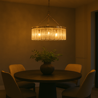 Five‑light chandelier with textured glass panels, gilt metal fittings and adjustable chain, casting a warm glow over a dining table.