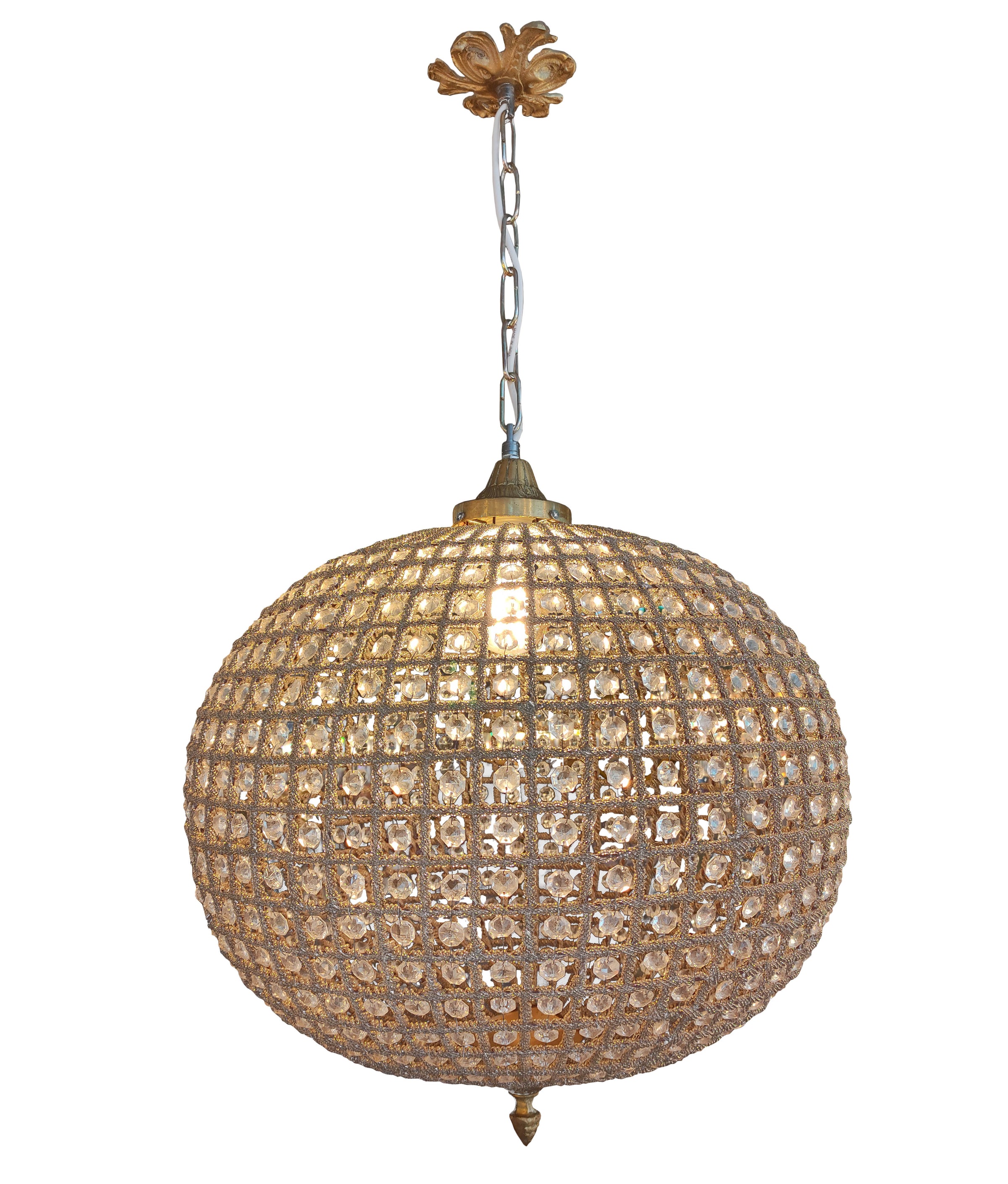 Extra, extra large, aged brass crystal globe chandelier with crystal beading encased in brass metalwork that reflects a pretty pattern around your ceiling and walls. 