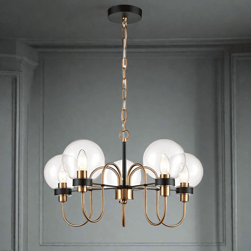 Five Clear glass globes on the five metal arms in antique gold on matte black, a stunning medium size statement light. Adjustable chain offers a long drop for this fitting. An extremely unusual fitting, suitable for a study, bedroom or smaller living room.
