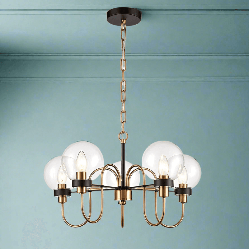 Five Clear glass globes on the five metal arms in antique gold on matte black, a stunning medium size statement light. Adjustable chain offers a long drop for this fitting. An extremely unusual fitting, suitable for a study, bedroom or smaller living room.