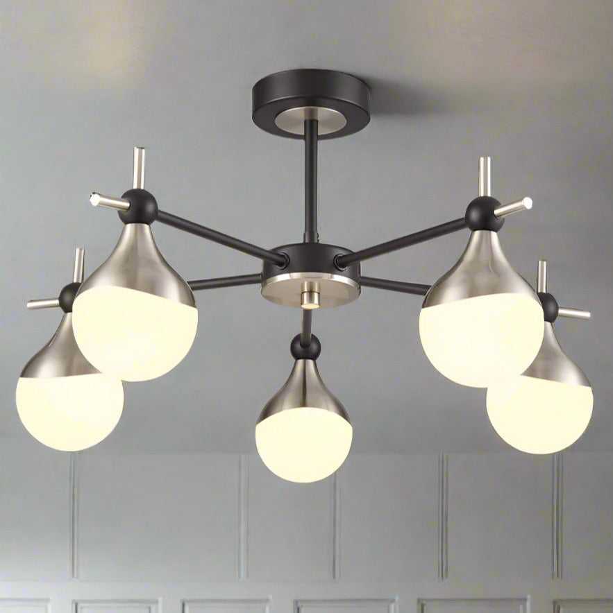 Semi-flush ceiling light with five opaque glass globes and nickel accents.
