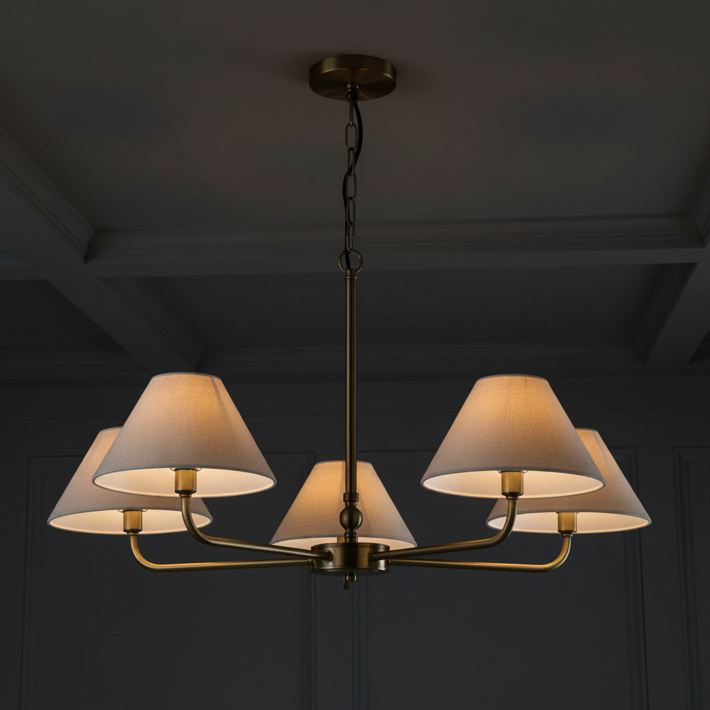 Chandelier with five lampshades on a white background