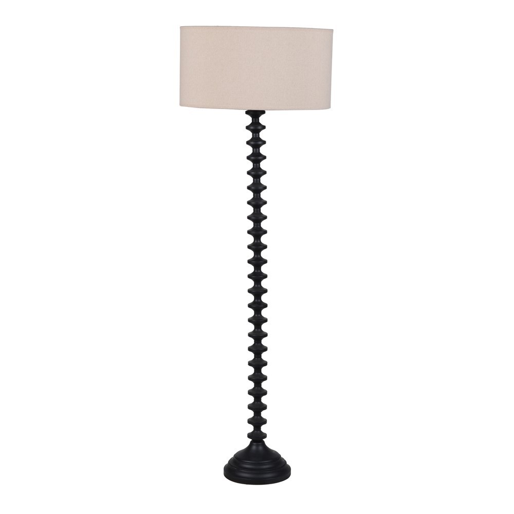 Black wooden floor lamp and linen coloured shade. 