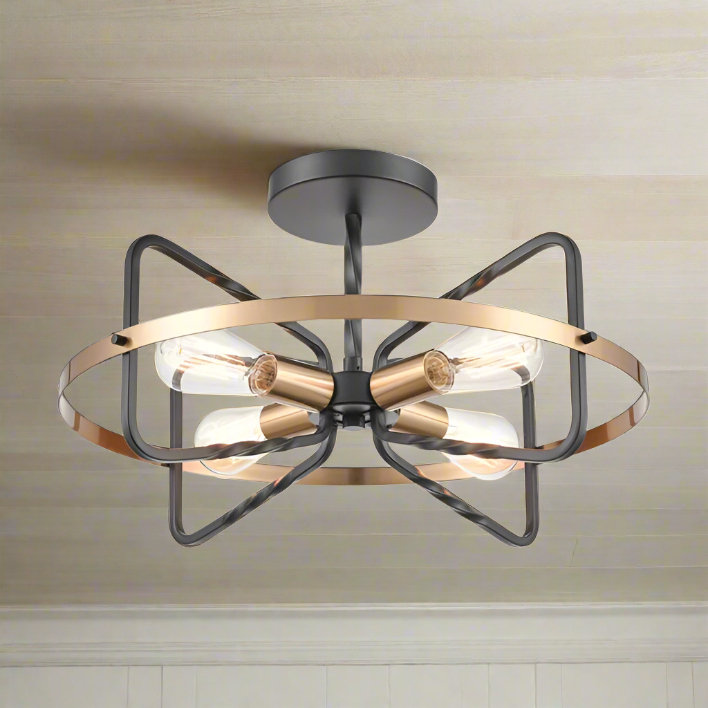 Black and gilt metal ribbon style semi-flush pendant, stylish design with 4 filament bulbs. Black chain and ceiling rose. This comes on a longer chain or flush to the ceiling. Exceptional design and quality, an impressive alternative for a low ceiling.&nbsp; Perfect in a hall, stairwell or entryway.&nbsp;&nbsp; A stylish addition to a living room or hanging over a contemporary dining table.

H: 31 cm (Min) 140 cm (max) W: 52 cm