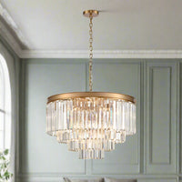 Four‑tier chandelier with cascading clear crystal rods and a polished gold band, hanging from an adjustable chain.