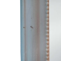 detail of the distressed frame of the cheval mirror