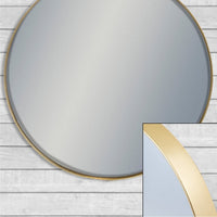 close up of frame on giant circular mirror.