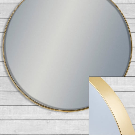 close up of frame on giant circular mirror.