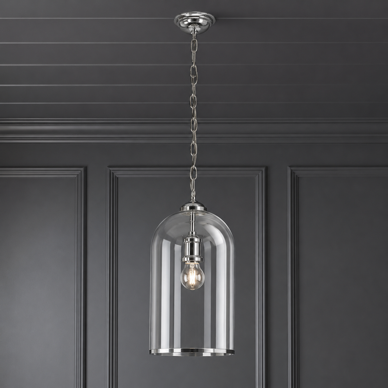 Clear glass and nickel banded pendant hanging from a grey paneled ceiling against a a grey painted wall.