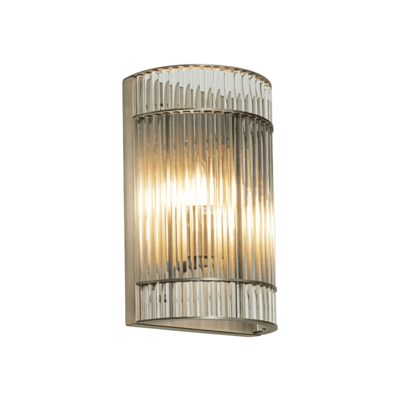 Vertical glass rods on a brass metal base, a bathroom wall light IP65 rated, 