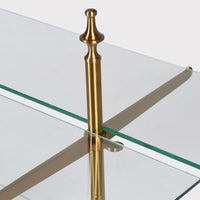 A brass, glass and marble table top shelving unit.&nbsp; Rectangular glass shelves sitting on a brushed brass stand.&nbsp; The two tier shelf sits on a table to display all your most decorative objet d'art.&nbsp; A perfect retail shelf for jewelry, perfume or accessories,&nbsp; Two brass poles set into round marble feet hold the brass struts for the glass shelving.&nbsp; In your bathroom, bedroom or in a retails pace the perfect way to show off all your prized items.

H: 90 cm W: 75 cm D: 46 cm