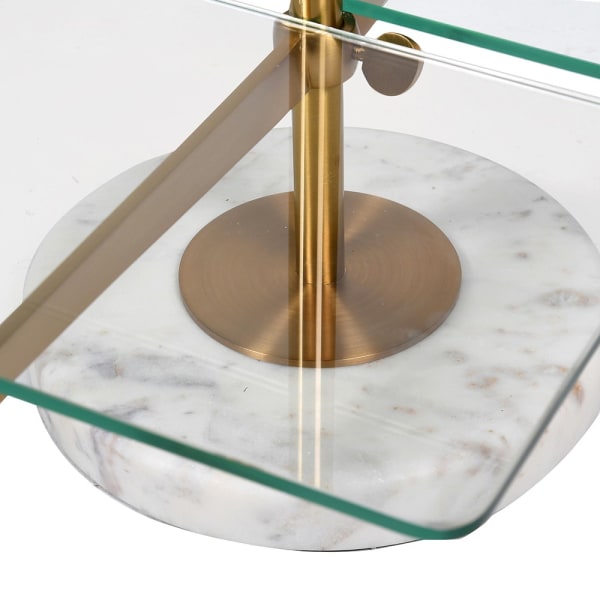 A brass, glass and marble table top shelving unit.&nbsp; Rectangular glass shelves sitting on a brushed brass stand.&nbsp; The two tier shelf sits on a table to display all your most decorative objet d'art.&nbsp; A perfect retail shelf for jewelry, perfume or accessories,&nbsp; Two brass poles set into round marble feet hold the brass struts for the glass shelving.&nbsp; In your bathroom, bedroom or in a retails pace the perfect way to show off all your prized items.