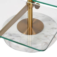 A brass, glass and marble table top shelving unit.&nbsp; Rectangular glass shelves sitting on a brushed brass stand.&nbsp; The two tier shelf sits on a table to display all your most decorative objet d'art.&nbsp; A perfect retail shelf for jewelry, perfume or accessories,&nbsp; Two brass poles set into round marble feet hold the brass struts for the glass shelving.&nbsp; In your bathroom, bedroom or in a retails pace the perfect way to show off all your prized items.