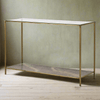 Glass topped console with lower oxidised metal shelf.&nbsp; The effect of the lower shelf has a rich patina of deep bronzes, rusted reds and greens adding a time-worn aesthetic, stunning as it can be seen through the glass top of the table adding an unusual, vintage industrial twist to the table.&nbsp; Supported by four gilt metal legs and gilt frame. the overall effect of this piece is of luxury.