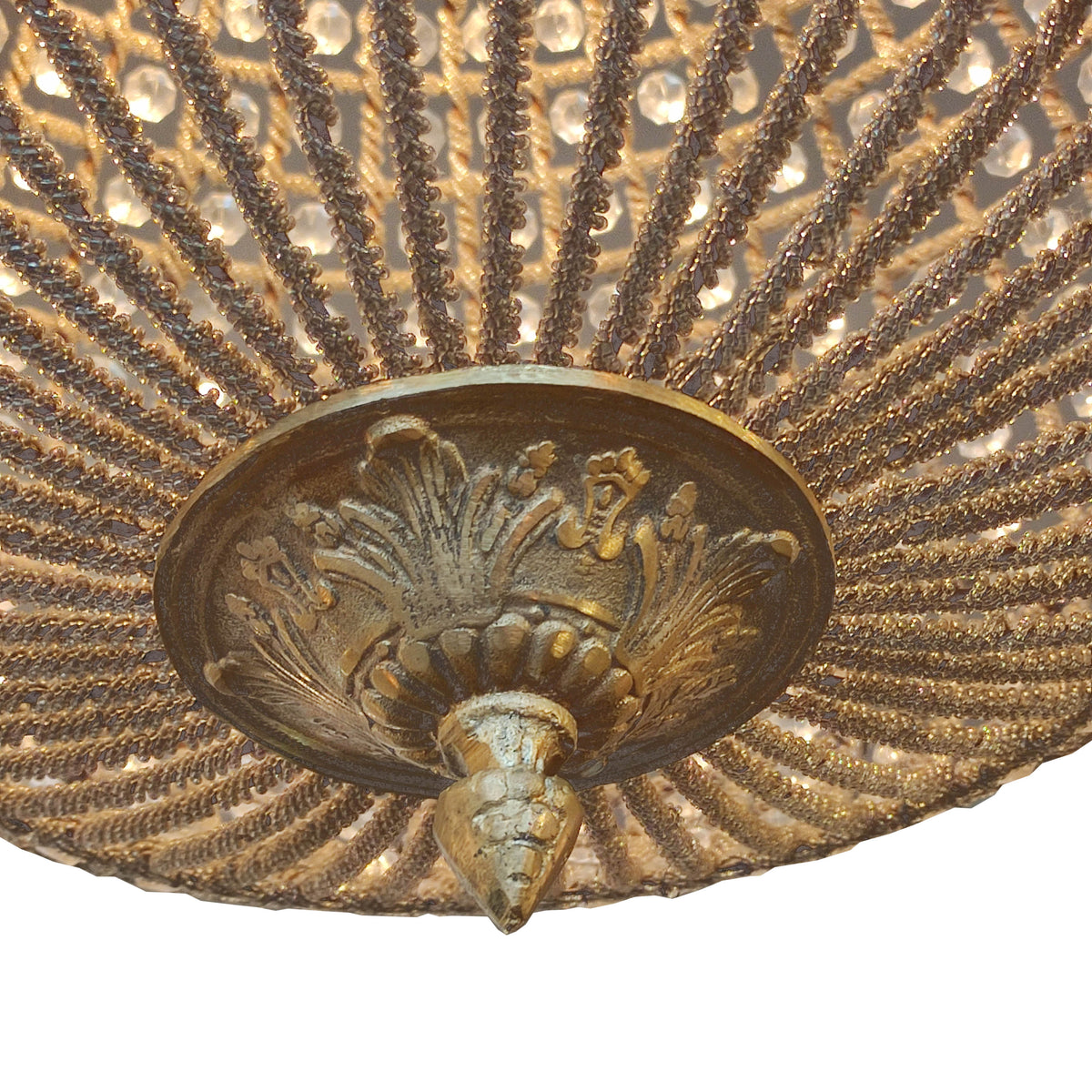 Extra, extra large, aged brass crystal globe chandelier with crystal beading encased in brass metalwork that reflects a pretty pattern around your ceiling and walls. Crystal globe chandeliers are a&nbsp; classic and glamorous ceiling light which compliments all types of decor.&nbsp; Globe chandeliers create a dazzling effect as light refracts through the crystals.