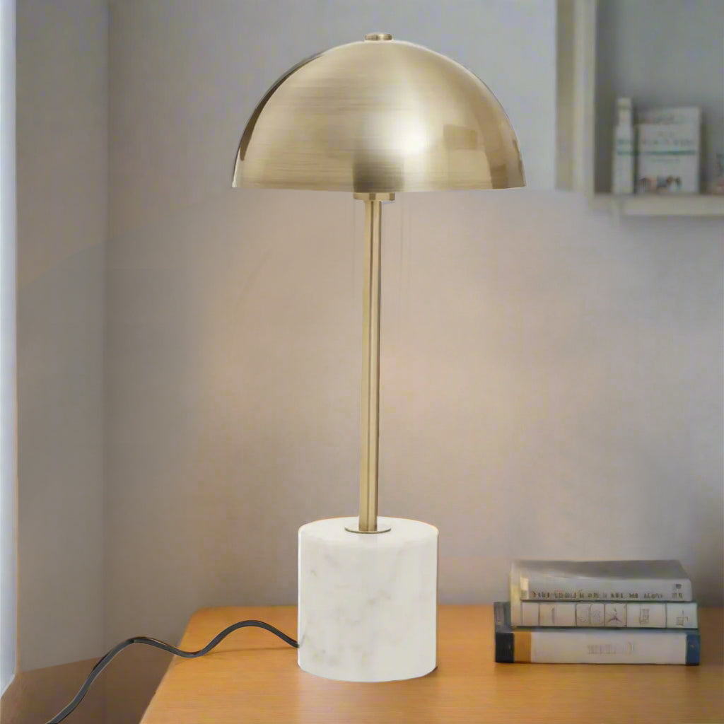 Gold dome table lamp with marble base, 56cm high on a table