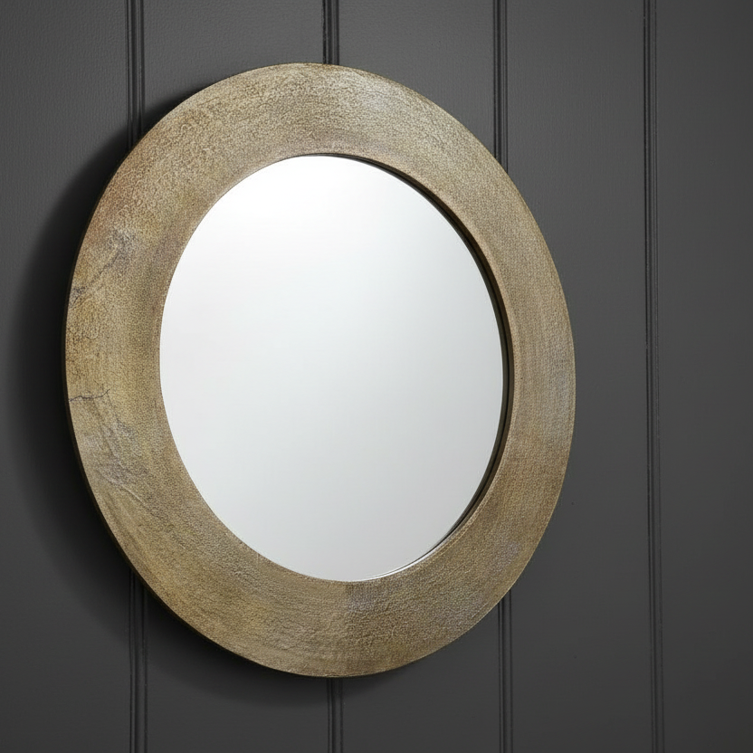 Hammered brass metal framed mirror. A great, statement circular mirror with a metal frame. Deep metal frame in gold adds to the glamour of this exceptional mirror.