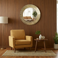 Hammered brass metal framed mirror. A great, statement circular mirror with a metal frame. Deep metal frame in gold adds to the glamour of this exceptional mirror.