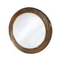A round wall mirror with a distressed gold, deeply textured frame.