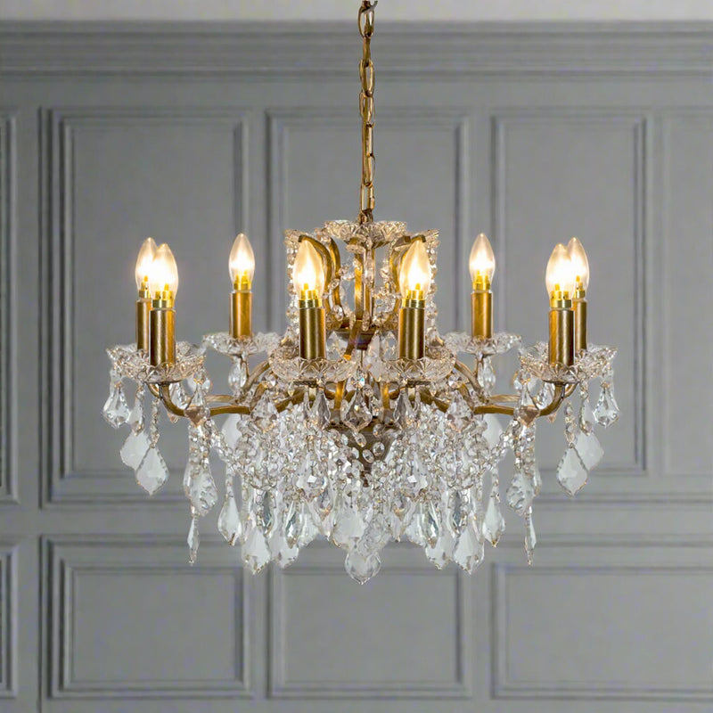 Shallow, crystal eight arm chandelier, the classic light covered in crystal drops perfect fixture or your period home. In a bedroom, hall or smaller living room this will give you all the light you need.