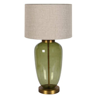 A table lamp with a textured beige linen drum shade, a glossy olive green glass vase-shaped base, and a gold-finished metal collar and circular base, shown against a plain white background.